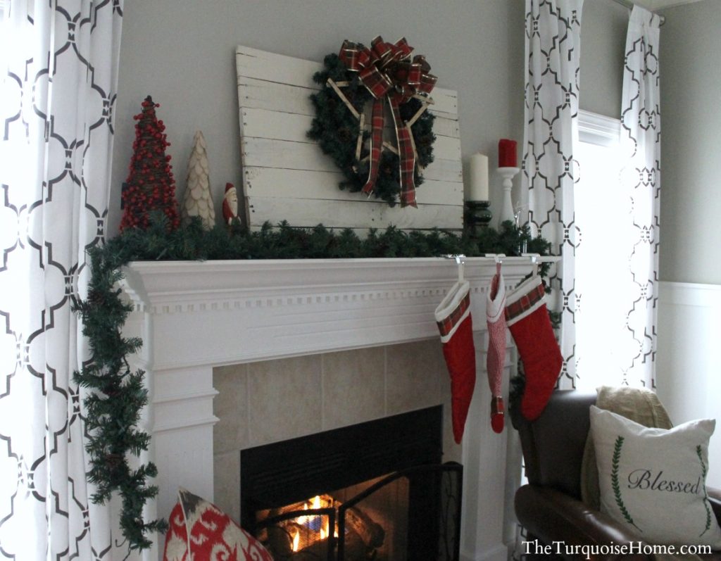 Traditional Red and Green Christmas Mantel. Find out all the details at TheTurquoiseHome.com