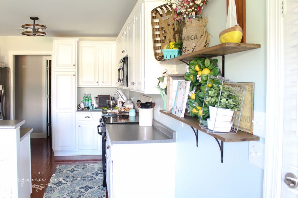 Gorgeous Sea Salt by Sherwin Williams on the kitchen walls and Simply White by Benjamin Moore on the cabinets