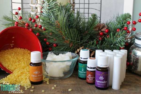 Using just three simple ingredients and a couple of minutes of your time, you can have homemade, all-natural lip balms to give away as gifts or keep for yourself. LOVE these as stocking stuffers or a gift anytime "just because." | TheTurquoiseHome.com