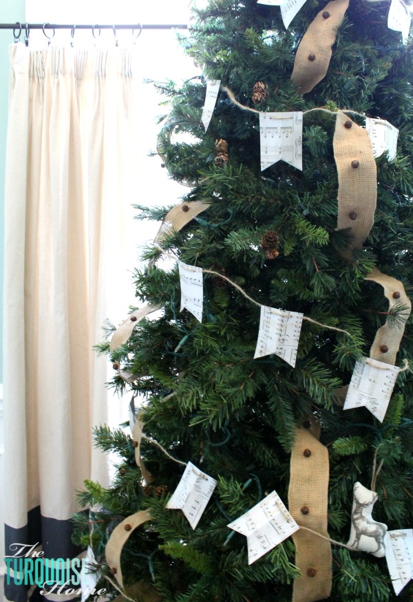 What a simple and easy way to fill a large Christmas tree. Both festive and cheap!! DIY Scrapbook Paper Christmas Garland | TheTurquoiseHome.com