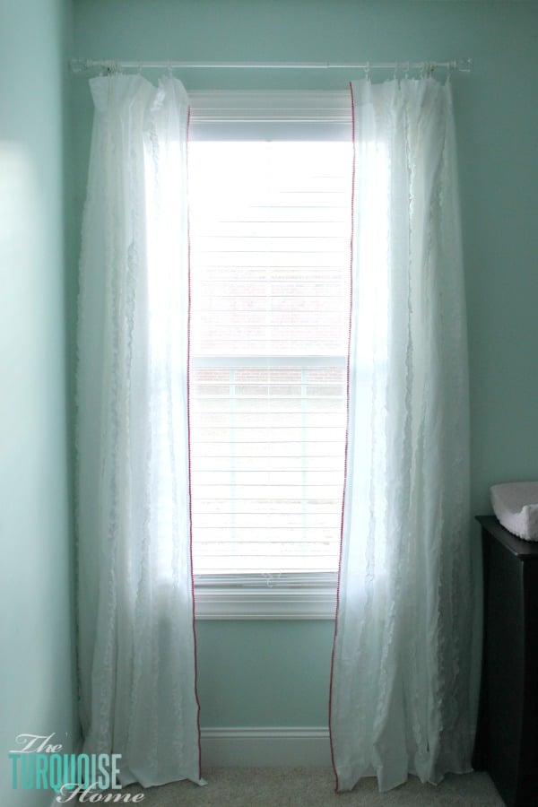 I love the little detail of the pom pom trim. And it's no-sew, my favorite!! Sweet Nursery Curtains with No-Sew Pom Pom Trim | TheTurquoiseHome.com