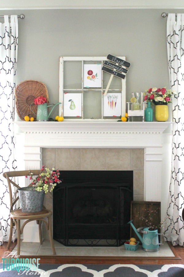 I love these fresh pops of colors and citrus inspiration on this fun summer mantel! A Garden and Lemonade Stand Summer Mantel. Get all the juicy details at TheTurquoiseHome.com