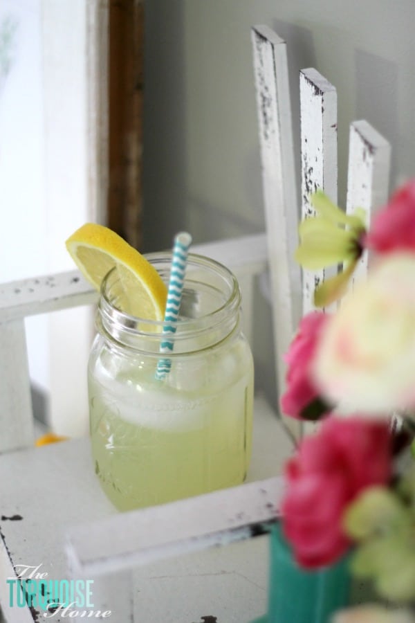 I love these fresh pops of colors and citrus inspiration on this fun summer mantel! A Garden and Lemonade Stand Summer Mantel. Get all the juicy details at TheTurquoiseHome.com