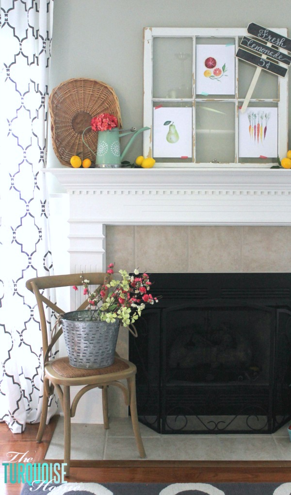 I love these fresh pops of colors and citrus inspiration on this fun summer mantel! A Garden and Lemonade Stand Summer Mantel. Get all the juicy details at TheTurquoiseHome.com