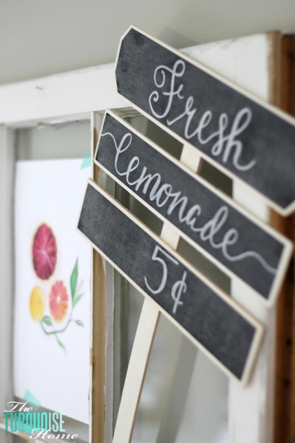 I love these fresh pops of colors and citrus inspiration on this fun summer mantel! A Garden and Lemonade Stand Summer Mantel. Get all the juicy details at TheTurquoiseHome.com