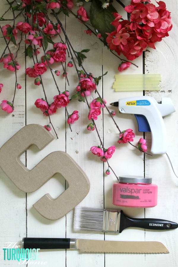 I love this sweet and simple DIY project - perfect for a baby girl's nursery | DIY Flower and Moss Initial Art via TheTurquoiseHome.com