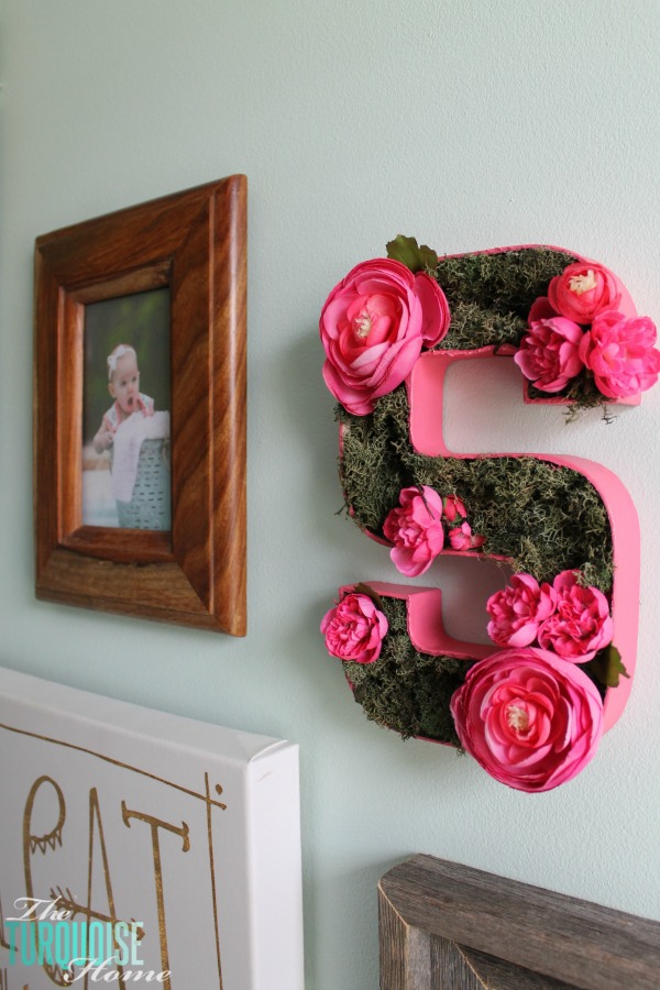 I love this sweet and simple DIY project - perfect for a baby girl's nursery | DIY Flower and Moss Initial Art via TheTurquoiseHome.com