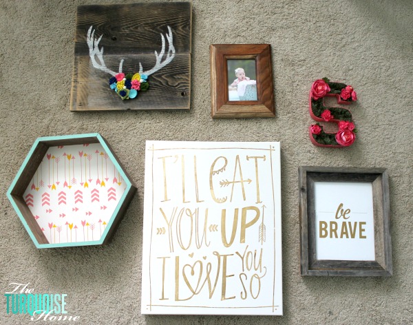 Such a sweet, girly gallery wall in a woodland nursery. All of the details at TheTurquoiseHome.com 