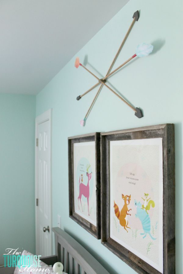 These DIY decorative arrows are so inexpensive and cute! The perfect finishing touch to a girl's woodland nursery. | Details at TheTurquoiseHome.com