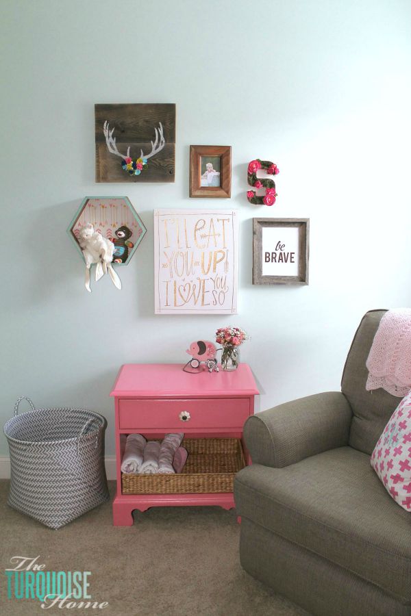 All of the pretty pink and turquoise touches with a woodland theme make a sweet retreat for any little girl. | Baby Girl's Woodland Nursery | All the details at TheTurquoiseHome.com