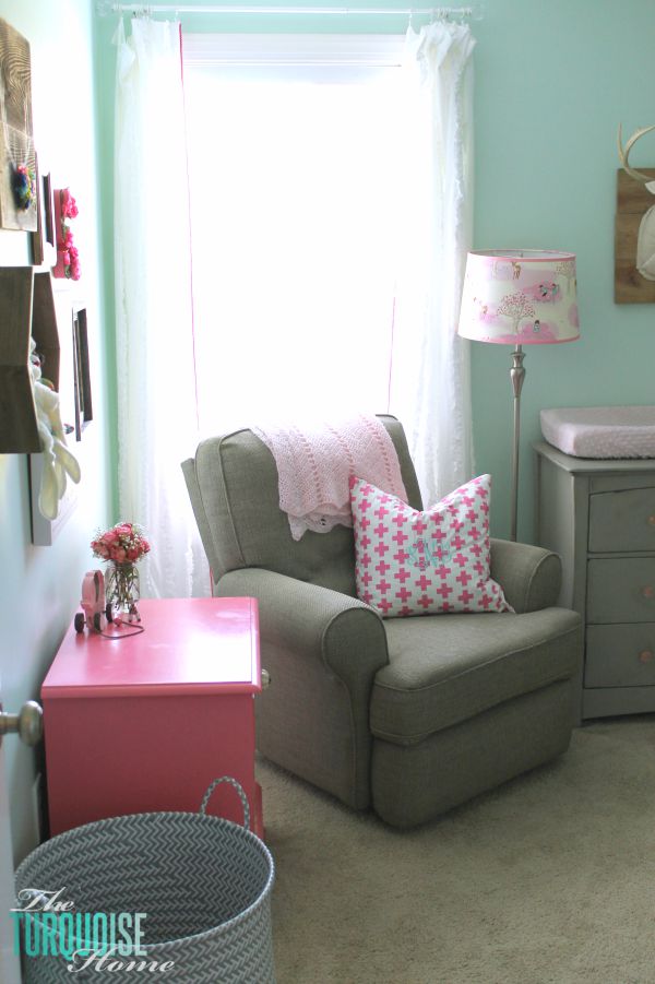 All of the pretty pink and turquoise touches with a woodland theme make a sweet retreat for any little girl. | Baby Girl's Woodland Nursery | All the details at TheTurquoiseHome.com 