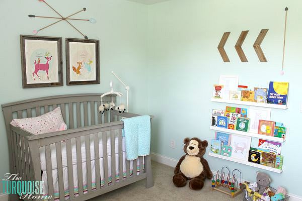 All of the pretty pink and turquoise touches with a woodland theme make a sweet retreat for any little girl. | Baby Girl's Woodland Nursery | All the details at TheTurquoiseHome.com