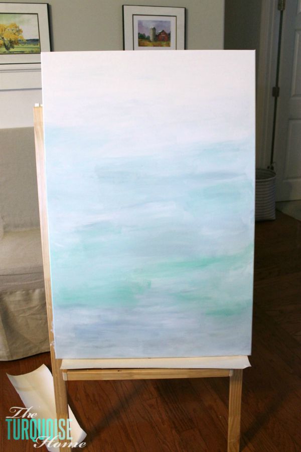 Gorgeous blue waters have the makings of an expensive abstract art piece, but it's not! It's a quick DIY project with just paint and a canvas! Less then $22 for custom, gorgeous art in your home. | Tutorial at TheTurquoiseHome.com