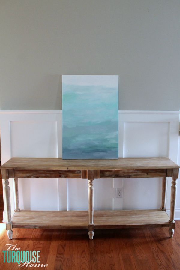 Gorgeous blue waters have the makings of an expensive abstract art piece, but it's not! It's a quick DIY project with just paint and a canvas! Less then $22 for custom, gorgeous art in your home. | Tutorial at TheTurquoiseHome.com