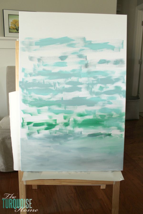 Gorgeous blue waters have the makings of an expensive abstract art piece, but it's not! It's a quick DIY project with just paint and a canvas! Less then $22 for custom, gorgeous art in your home. | Tutorial at TheTurquoiseHome.com