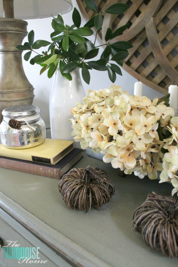 The temps are cooling down and it's time to break out the sweaters and the boots. Love this neutral fall vignette! (and a Come Thou Fount free printable) | Details and Printable at TheTurquoiseHome.com