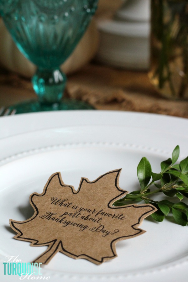 Gorgeous! This pretty, colorful fall or Thanksgiving tablescape is just beautiful with pops of turquoise, orange and red! And those beautiful goblets are my fave!