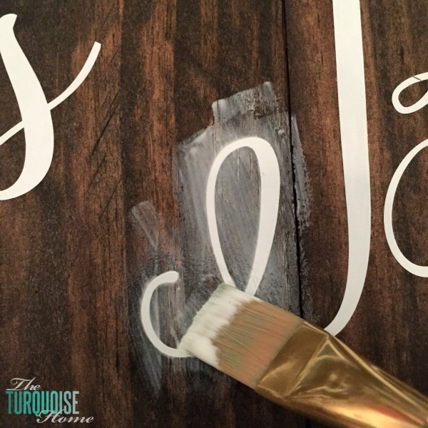 Use this awesome trick with Mod Podge to give a clean crisp line when painting over vinyl. Full tutorial at TheTurquoiseHome.com