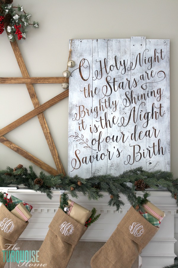 Personalize your Christmas decor with a DIY lettered pallet sign! Full tutorial at TheTurquoiseHome.com