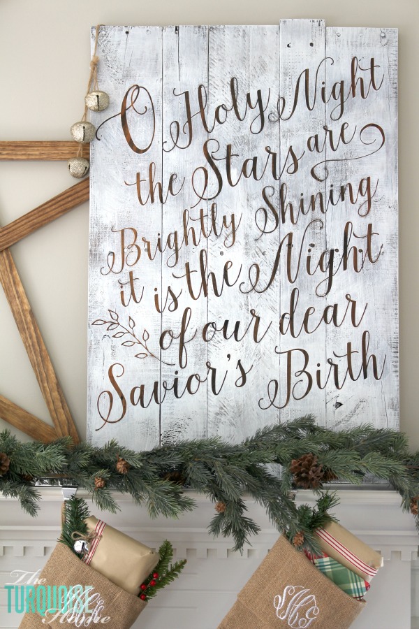 Personalize your Christmas decor with a DIY lettered pallet sign! Full tutorial at TheTurquoiseHome.com