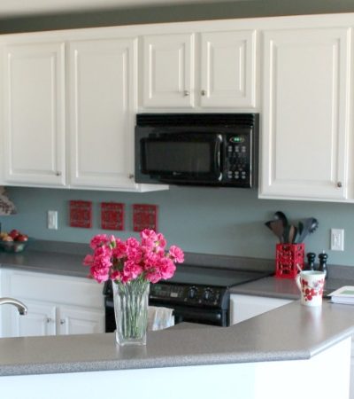 DIY Painted Kitchen Cabinets with Simply White from Benjamin Moore | Details at TheTurquoiseHome.com