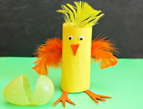 Crazy Easy Chick Easter Craft with a toilet paper roll and feathers.