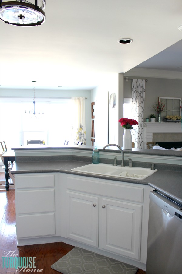 Love this light and airy farmhouse look!! Kitchen painted in Sea Salt (Sherwin Williams). | All the details at TheTurquoiseHome.com