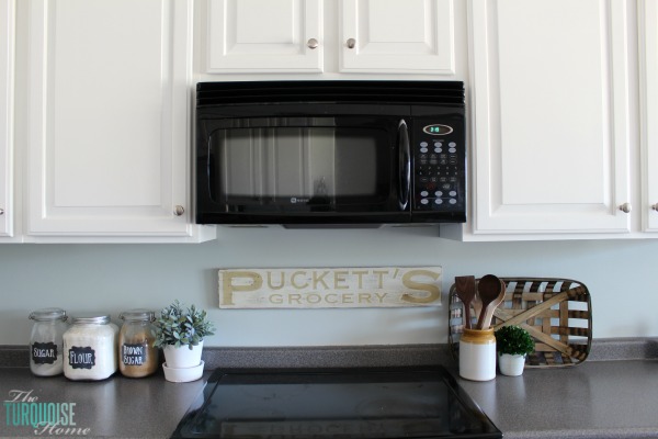 Love this light and airy farmhouse look!! Kitchen painted in Sea Salt (Sherwin Williams). | All the details at TheTurquoiseHome.com