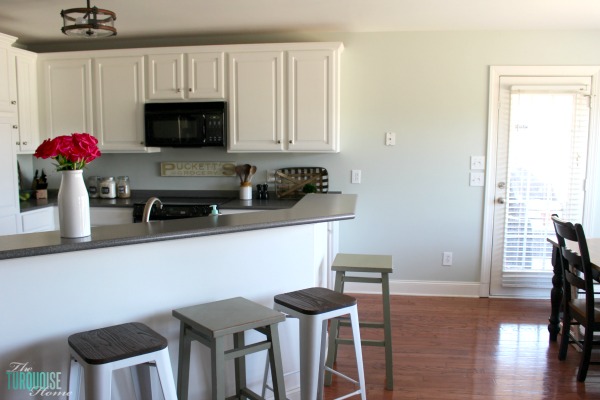 Love this light and airy farmhouse look!! Kitchen painted in Sea Salt (Sherwin Williams). | All the details at TheTurquoiseHome.com