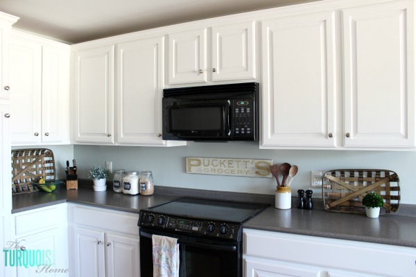 Love this light and airy farmhouse look!! Kitchen painted in Sea Salt (Sherwin Williams). | All the details at TheTurquoiseHome.com