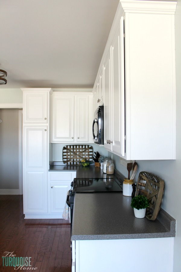 Love this light and airy farmhouse look!! Kitchen painted in Sea Salt (Sherwin Williams). | All the details at TheTurquoiseHome.com