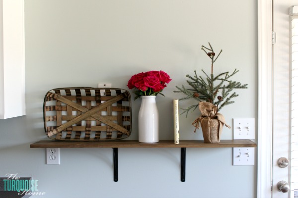 These simple DIY farmhouse shelves are easy to install and cost less than $40! They are perfect for adding some fun decor to the kitchen and I can't wait to change them out each season. | DIY Farmhouse Shelves | TheTurquoiseHome.com