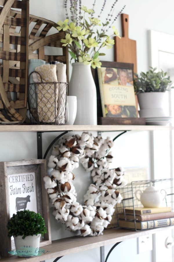 LOVE these tips for styling shelves. These $40 DIY shelves were transformed with some old and new farmhouse decor. | TheTurquoiseHome.com