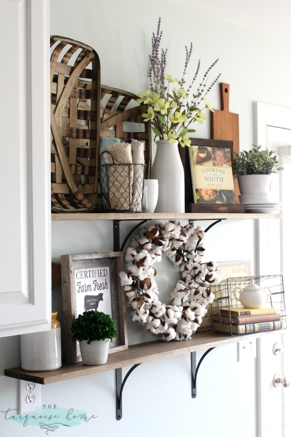 LOVE these tips for styling shelves. These $40 DIY shelves were transformed with some old and new farmhouse decor. | TheTurquoiseHome.com