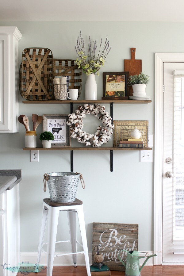 LOVE these tips for styling shelves. These $40 DIY shelves were transformed with some old and new farmhouse decor. | TheTurquoiseHome.com