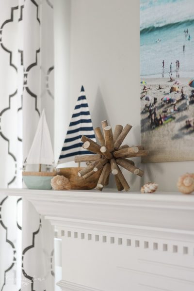 Such cute DIY projects, like the rope sign and the cheap large art! Relaxing at the Beach | Summer Mantel 2016