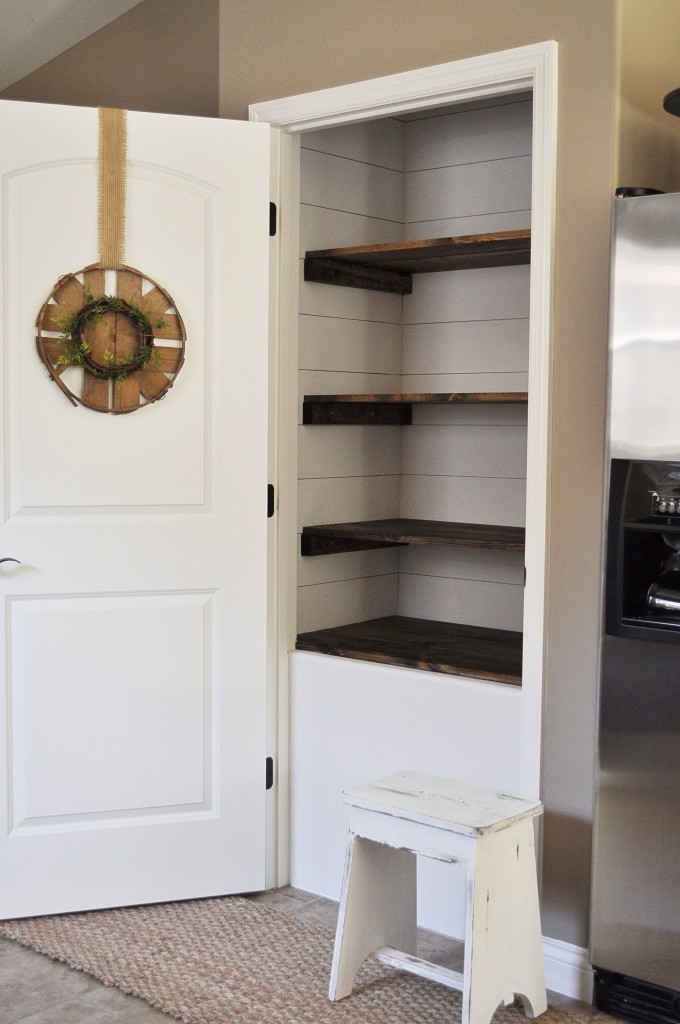 Farmhouse Pantry Makeover with wooden shelves.