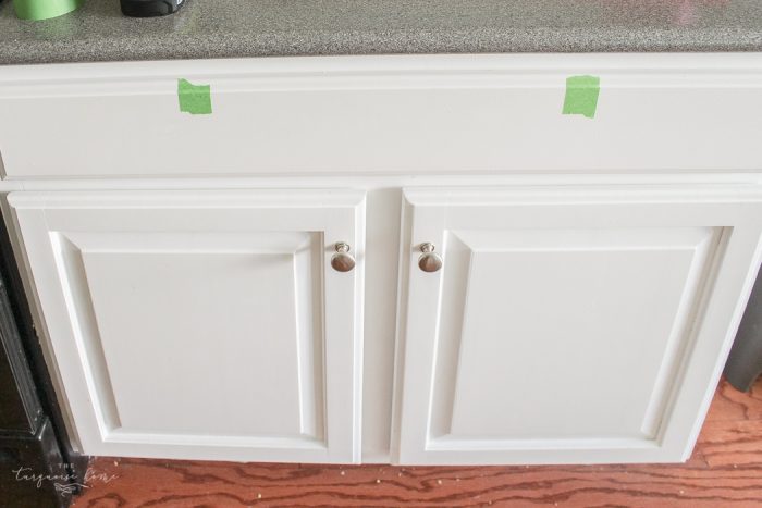 Installing cabinet hardware can be intimidating! This simple trick makes installing new cabinets pulls so easy!