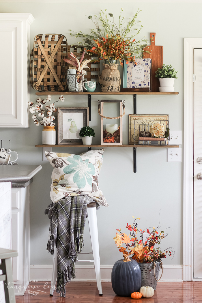 You don't have to have a huge storage room for seasonal decor! Just change out a few pieces here and there!! | How to Decorate Simply For Every Season | Fall Farmhouse Kitchen Shelves