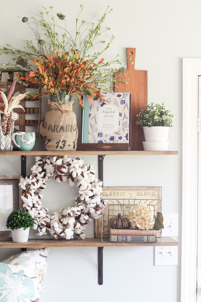 You don't have to have a huge storage room for seasonal decor! Just change out a few pieces here and there!! | How to Decorate Simply For Every Season | Fall Farmhouse Kitchen Shelves