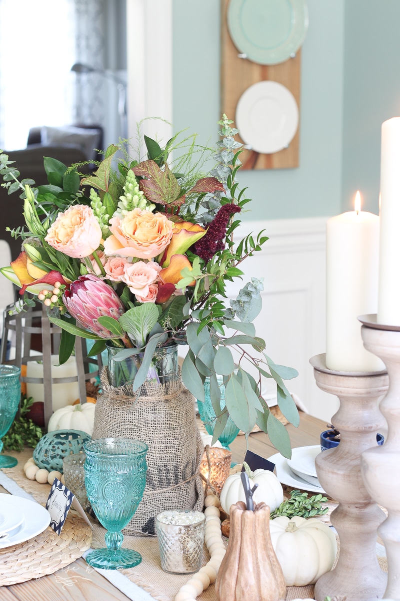 Farmgirl Flowers Fall Tablescape with pumpkins & turquoise goblets.