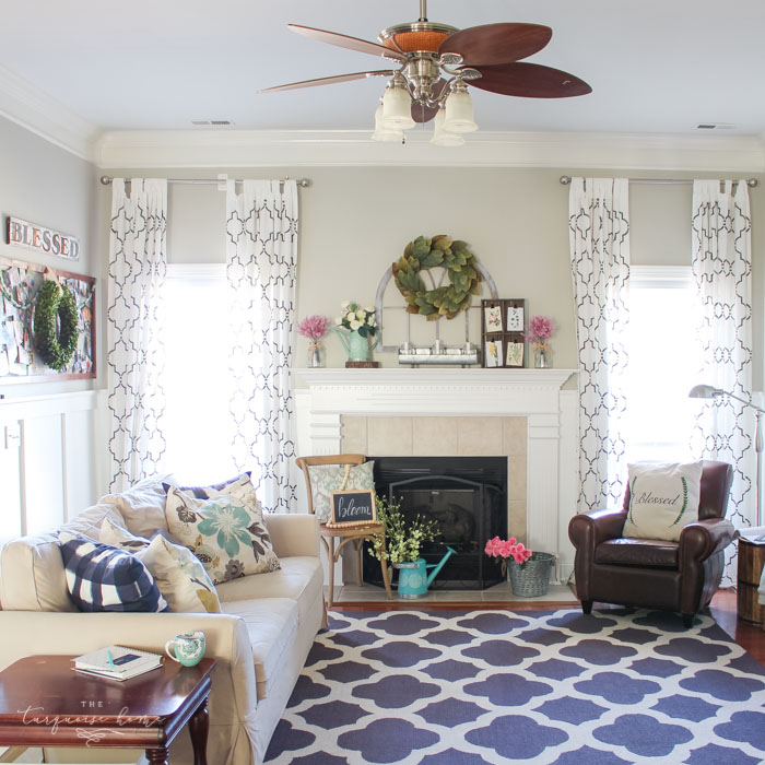 Isn't this just the prettiest pink and turquoise mantel?! Simple Floral Spring Mantel