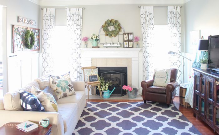 Isn't this just the prettiest pink and turquoise mantel?! Simple Floral Spring Mantel