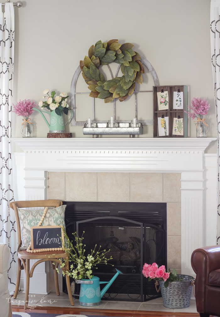 Isn't this just the prettiest pink and turquoise mantel?! Simple Floral Spring Mantel