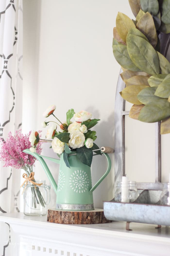 Isn't this just the prettiest pink and turquoise mantel?! Simple Floral Spring Mantel