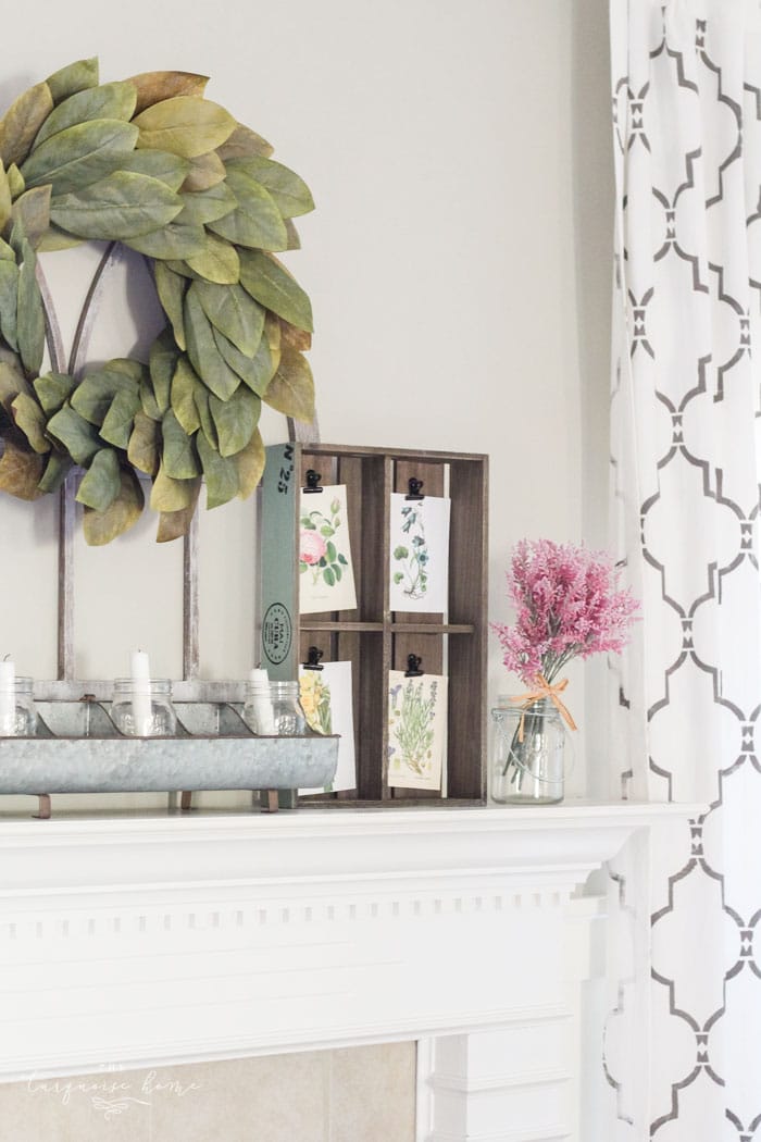 Isn't this just the prettiest pink and turquoise mantel?! Simple Floral Spring Mantel