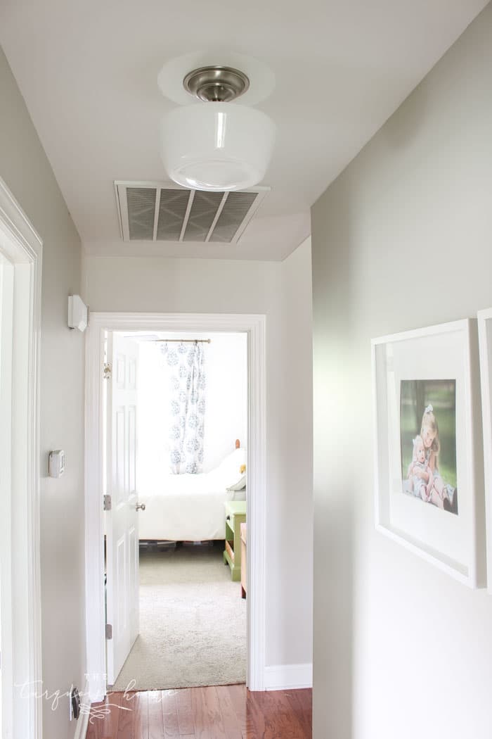 Love this quick and easy update! Add old house charm with affordable schoolhouse lighting!