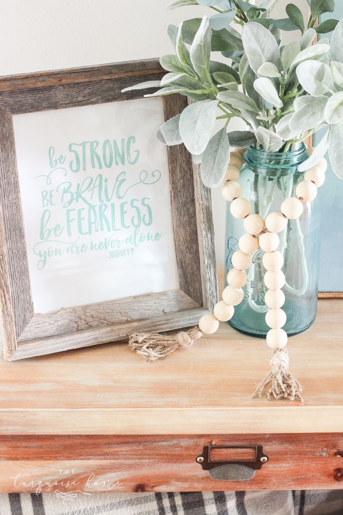 Super cute DIY Wood Bead Garland with Tassels is so easy and fun to make! Cheap, too!!