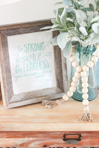 Super cute DIY Wood Bead Garland with Tassels is so easy and fun to make! Cheap, too!!