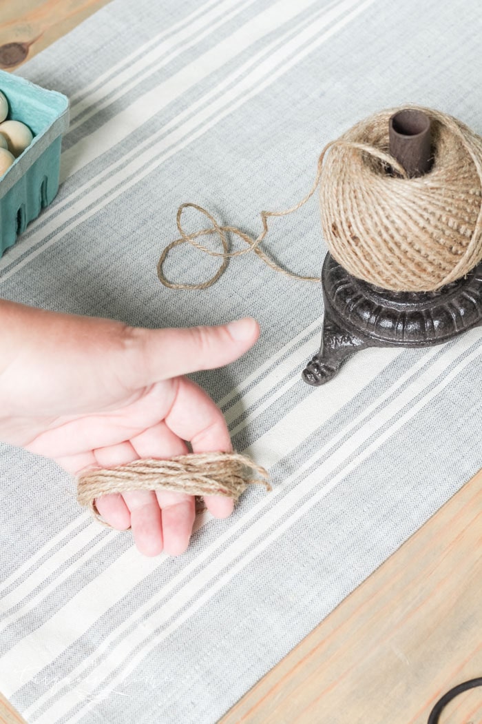 Super cute DIY Wood Bead Garland with Tassels is so easy and fun to make! Cheap, too!!